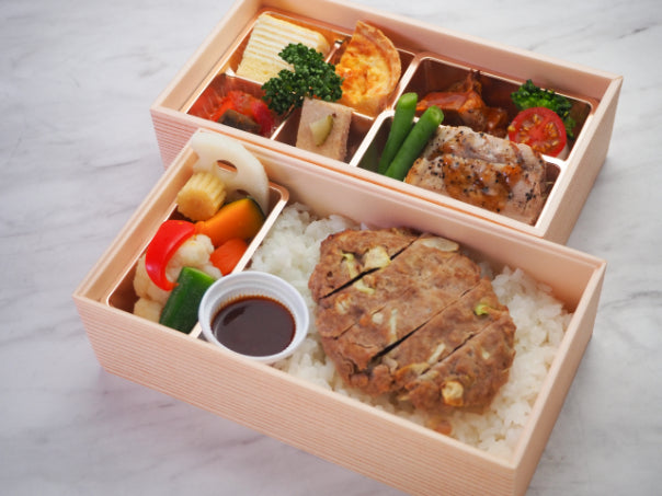 牛肉の煮込みと豚ロースのグリエの2段弁当